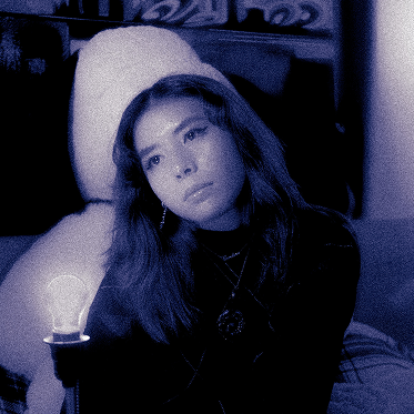 Carolina looking away with purple filter